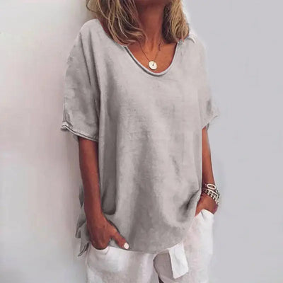 Lightweight cotton blouse for women by LondonLaneStore, featuring a flowy, relaxed fit summer top with short sleeves and soft fabric.